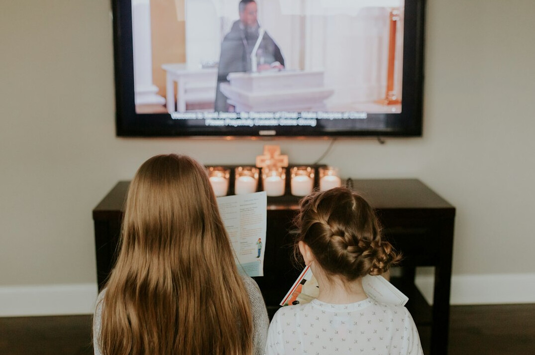 family watching tv together